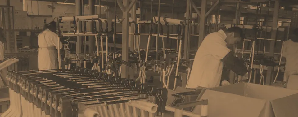 factory staff working on Mountain Buggy frame setup for and quality control