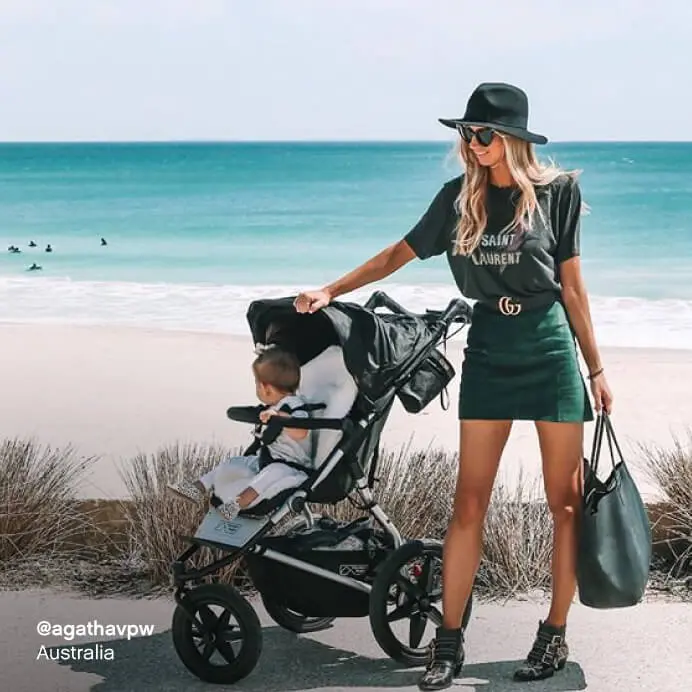 Mountain Buggy terrain all terrain pram – mum and toddler on coastal path with beach view, Australia