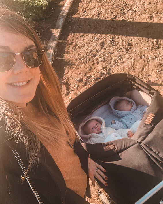 Newborn twins share their twin carrycot plus used with a duet™ pram - Mountain Buggy