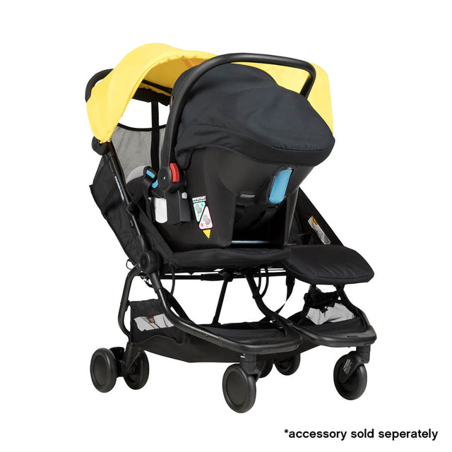 Mountain Buggy nano duo double lightweight buggy fitted with protect car seat in colour cyber_cyber