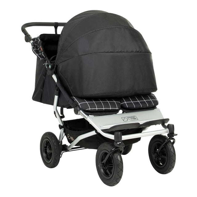 Mountain Buggy® newborn cocoon for twins shown as an example installed on the duet buggy