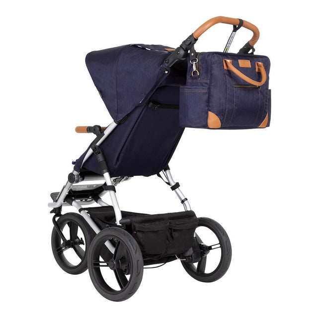urban jungle luxury in nautical fabric shown from rear with included diaper bag attached to handle bar_nautical
