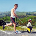 Mountain Buggy unirider with dad pushing his son while jogging_yellow
