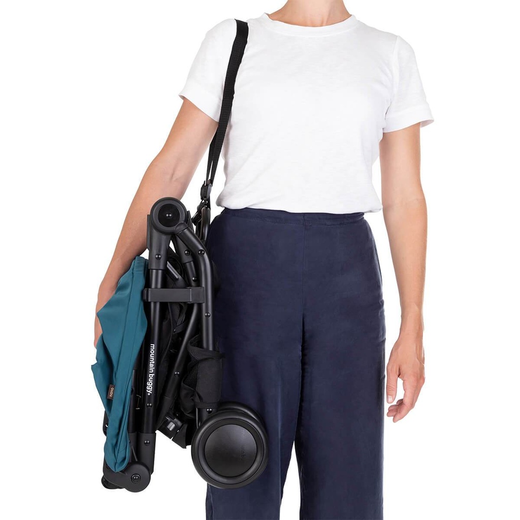 mountain buggy nano travel buggy in colour teal with easy to use shoulder strap for lightweight carrying_teal