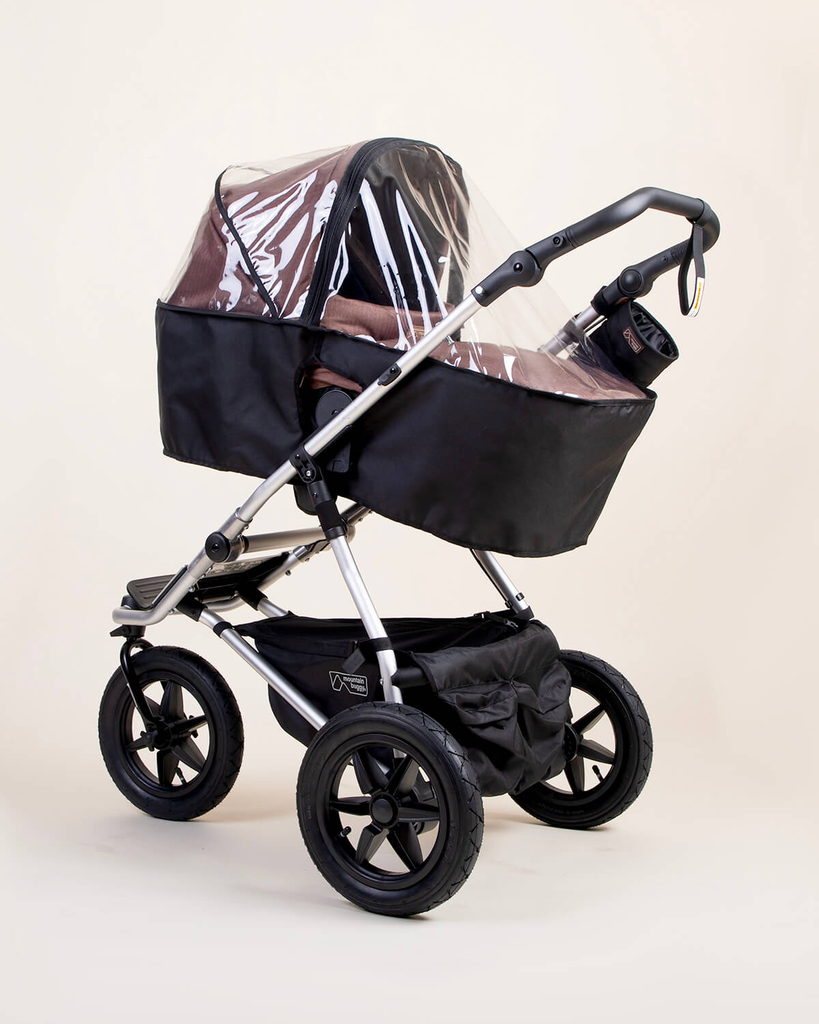 mountain-buggy-carrycot-plus-toddler-seat-storm cover-on-urban-jungle.webp