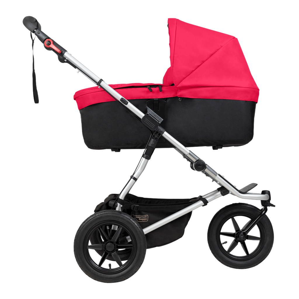 Mountain-Buggy-berry-carrycot-plus-on-urban-jungle-buggy-in-lie-flat-mode-side-view.webp