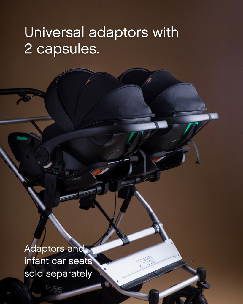 mountain-buggy-duet-carrycot-plus-universal-adaptors-with-2-capsule---with-text-1200x1500.webp